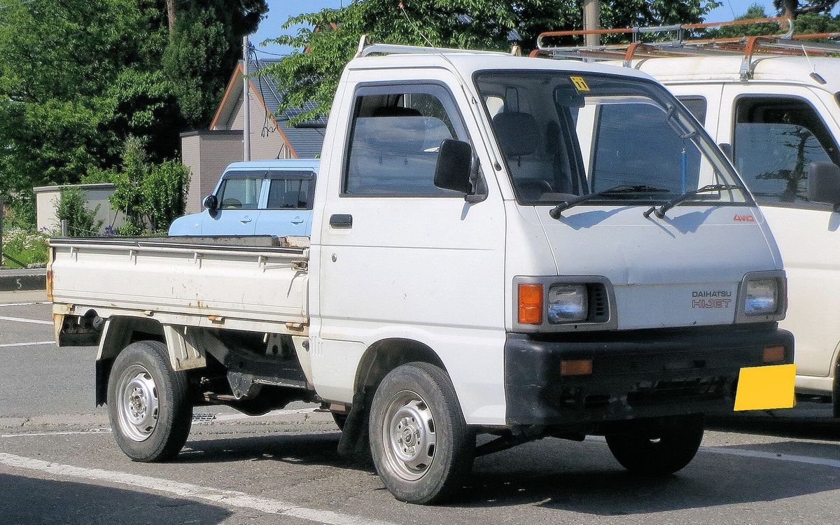 Daihatsu Hijet kei truck showing the standard flat bed and cab-over layout